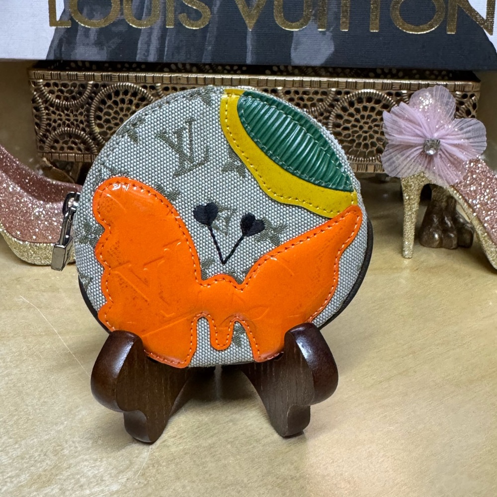 Louis Vuitton Round Coin Purse with Butterfly Design